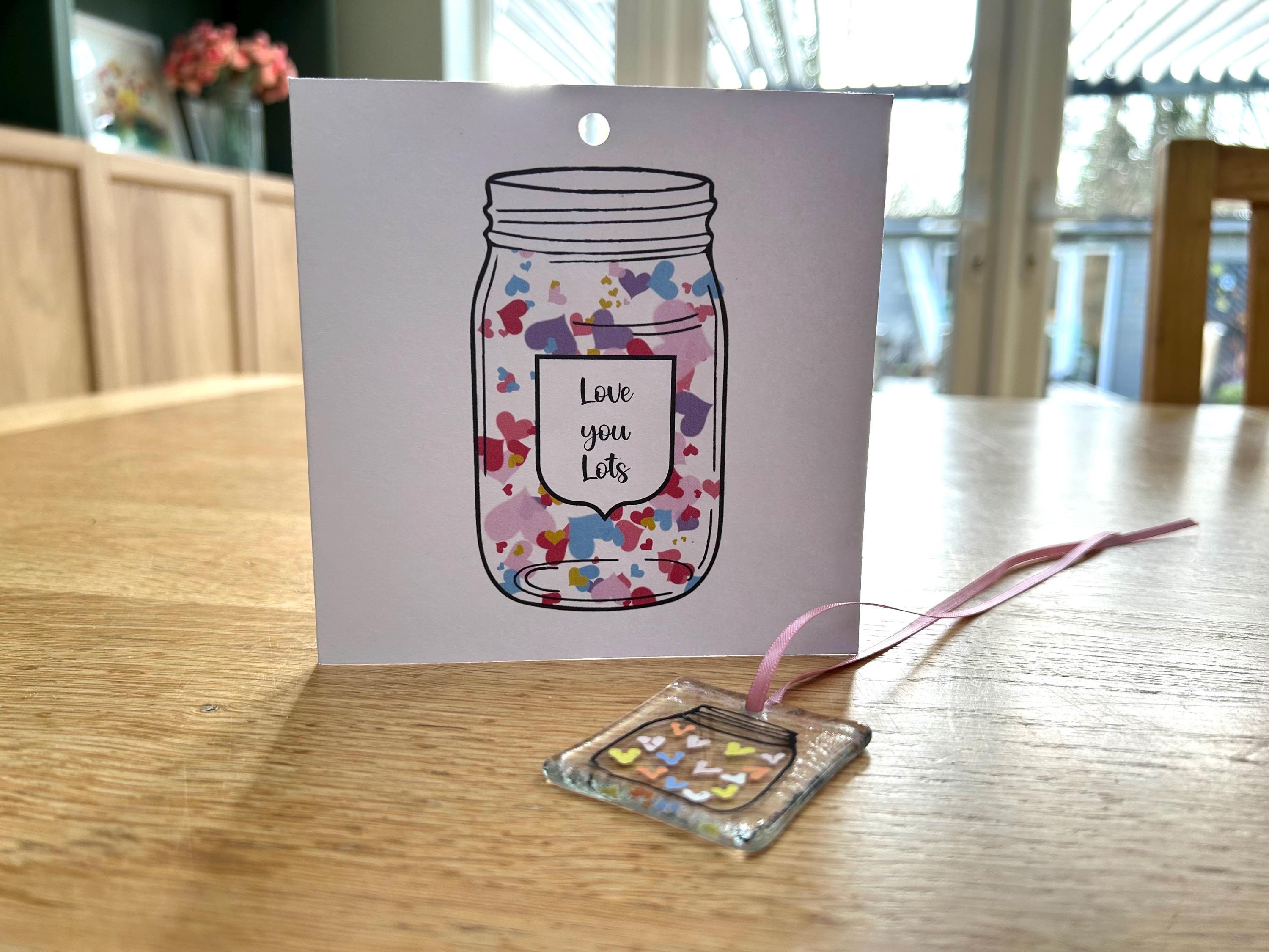 Greetings card with glass ornament with Jar of Hearts design