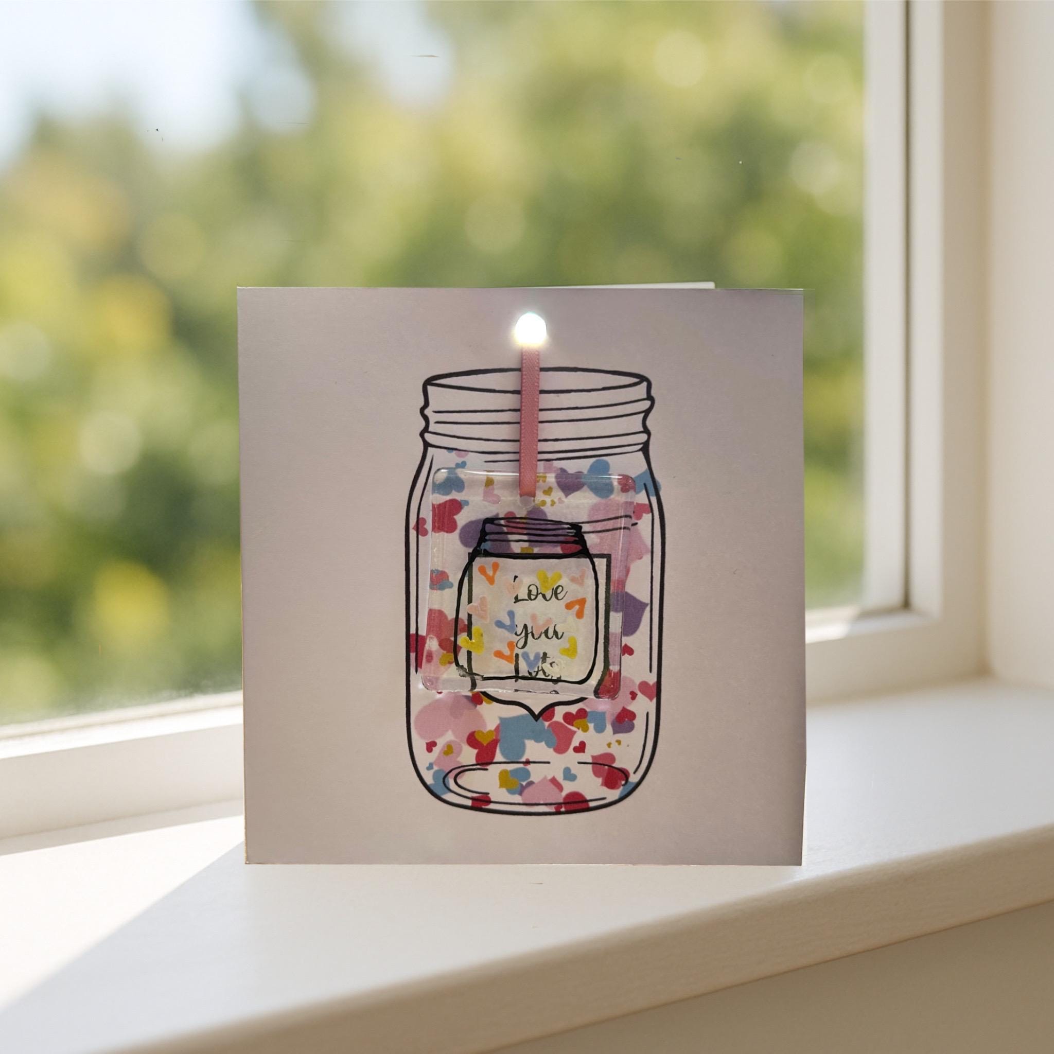 Greetings card with glass ornament with Jar of Hearts design
