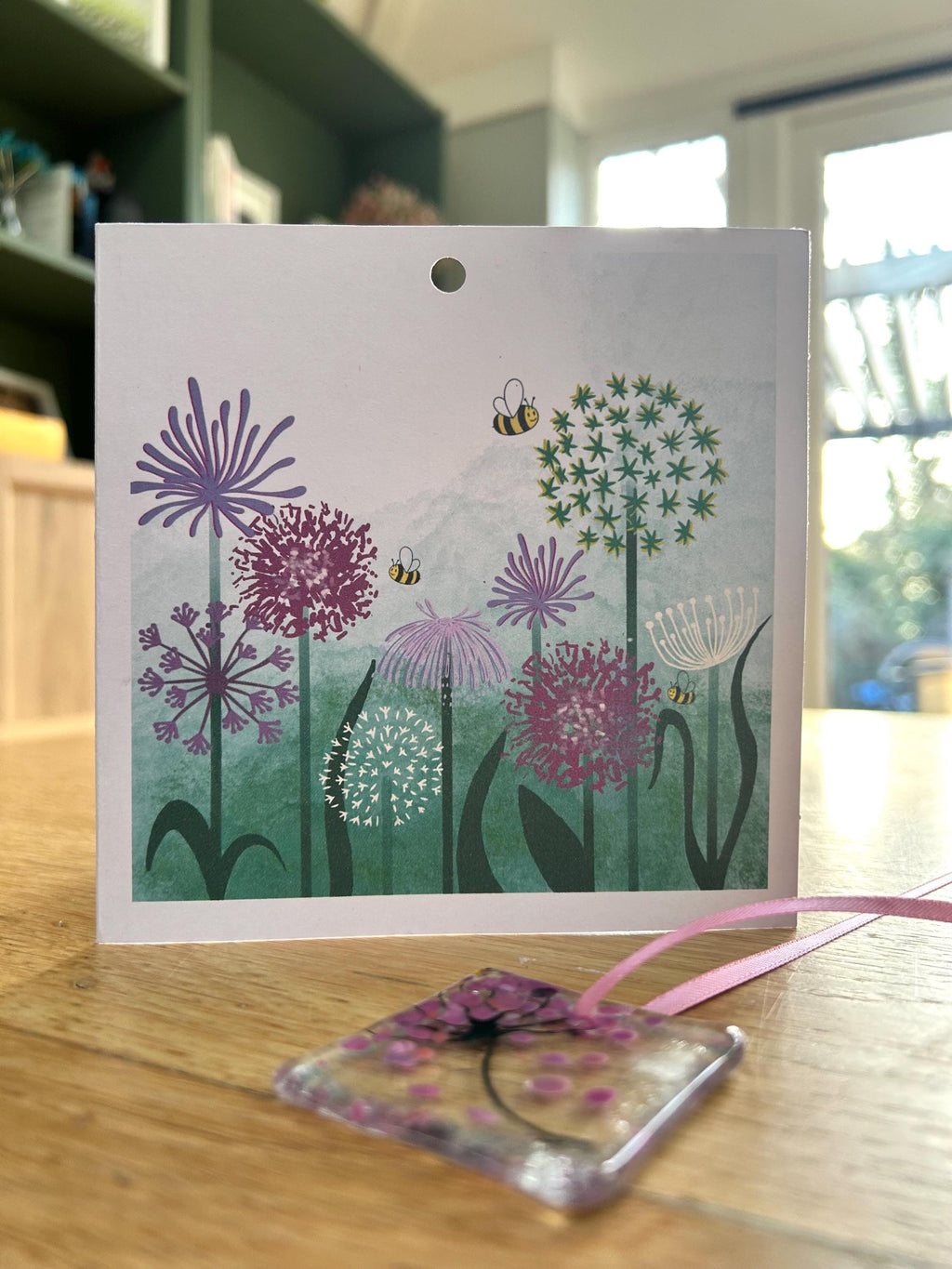 Floral greetings card with glass ornament