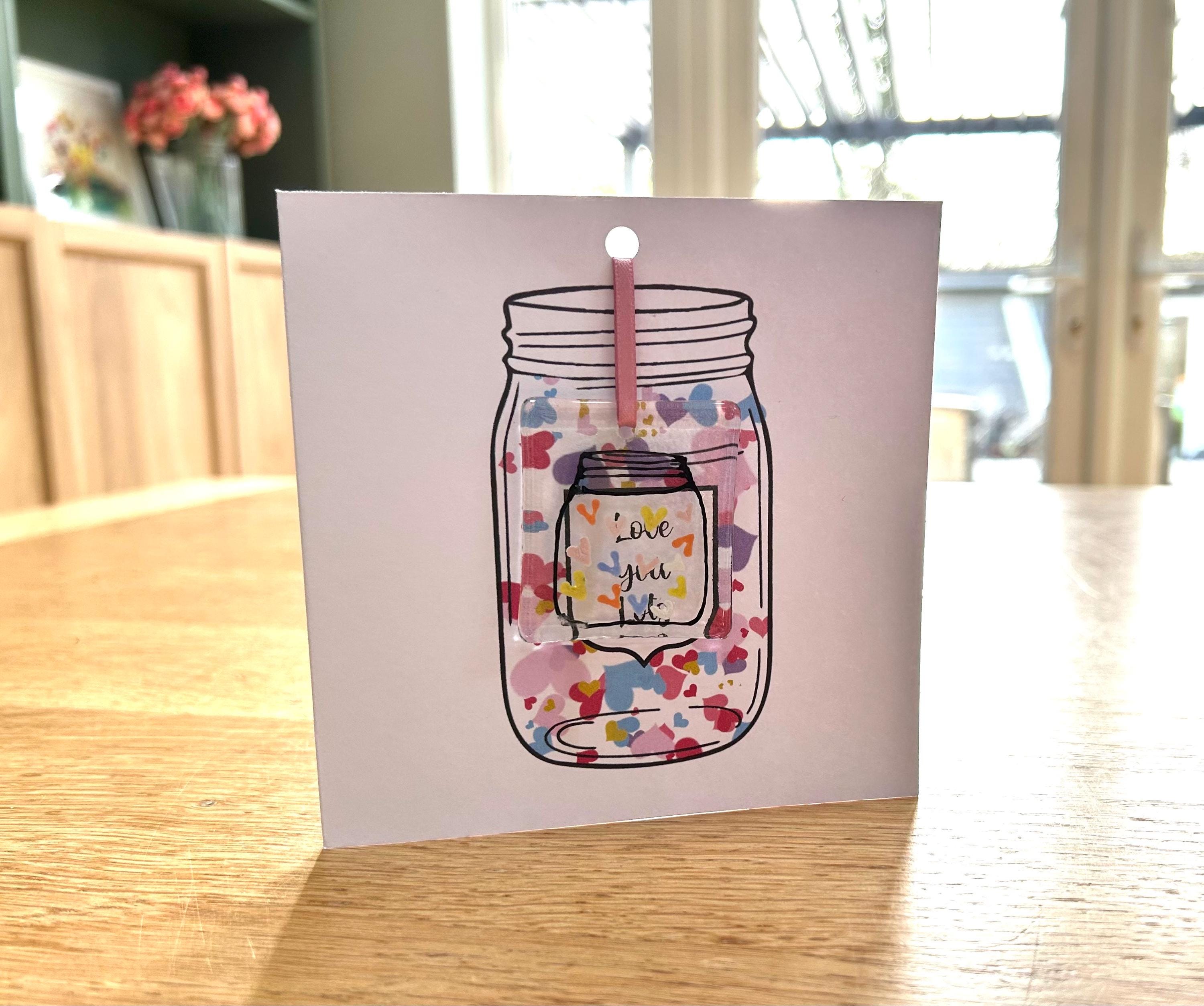 Greetings card with glass ornament with Jar of Hearts design