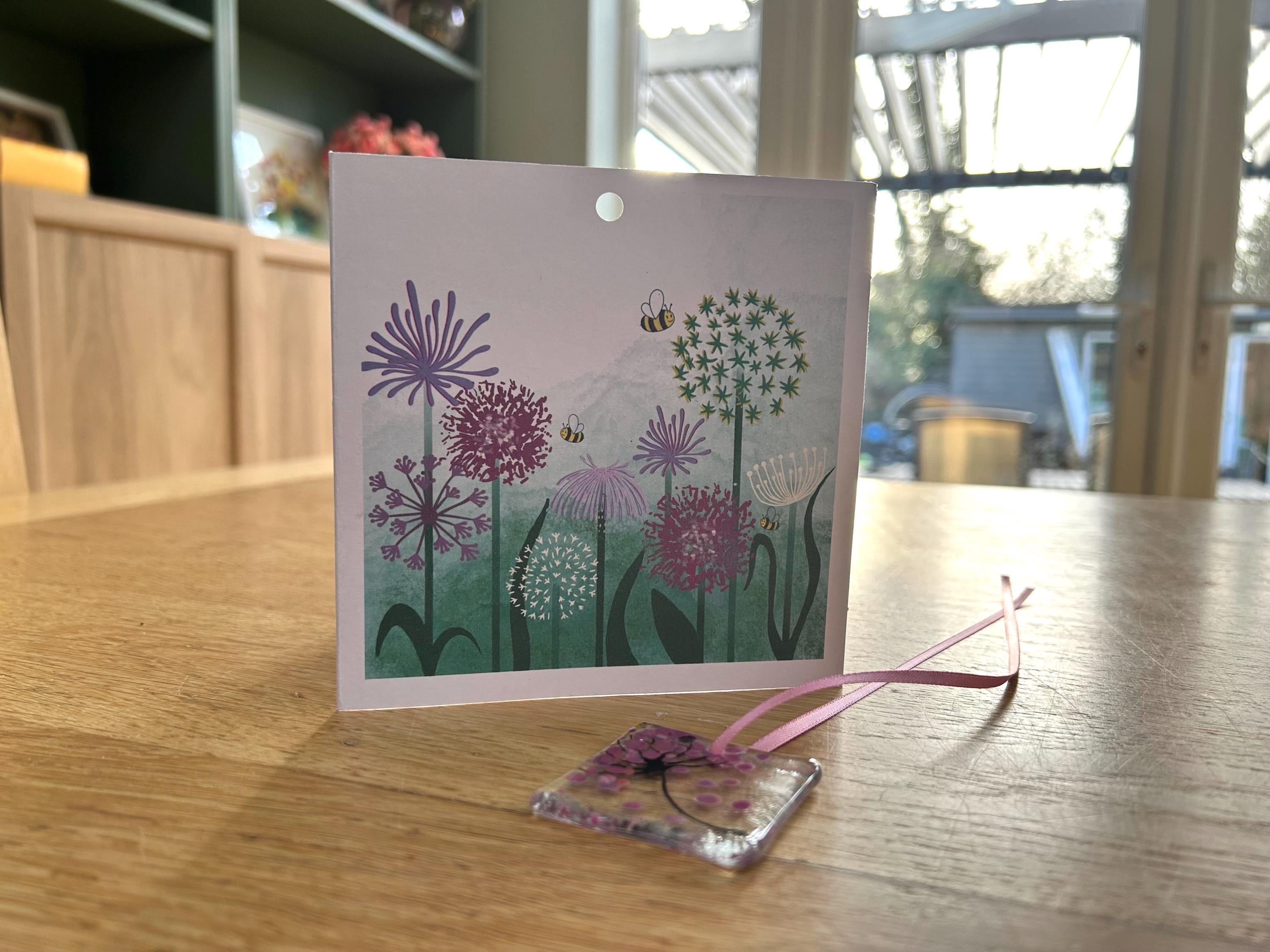 Floral greetings card with glass ornament